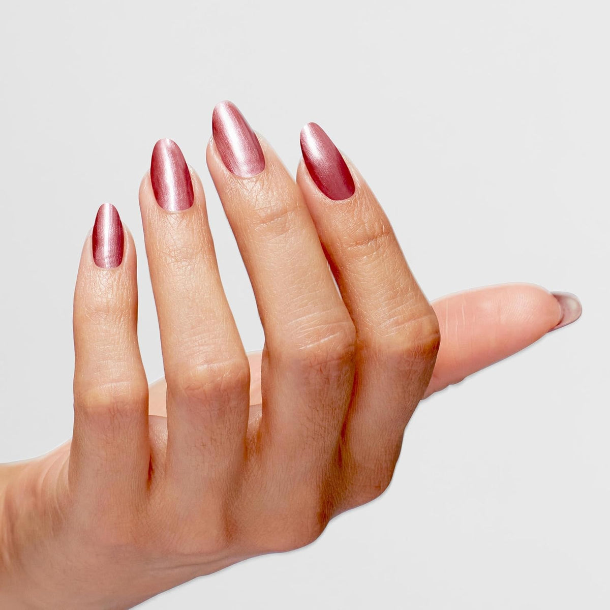 Close-up of OPI Infinite Shine Nail Polish Chicago Champaign Toast glossy finish