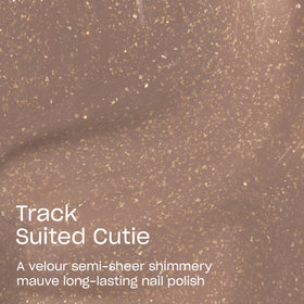 Close-up of OPI Infinite Shine Track Suited Cutie nail polish bottle