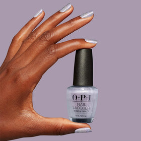 Close-up of OPI Nail Lacquer brush and shimmer finish