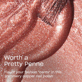 Close-up of OPI Nail Lacquer brush with soft brown shimmer