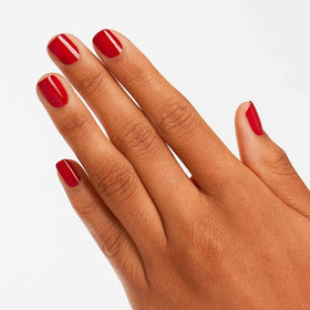 Close-up of OPI Nail Lacquer Red Hot Rio brush