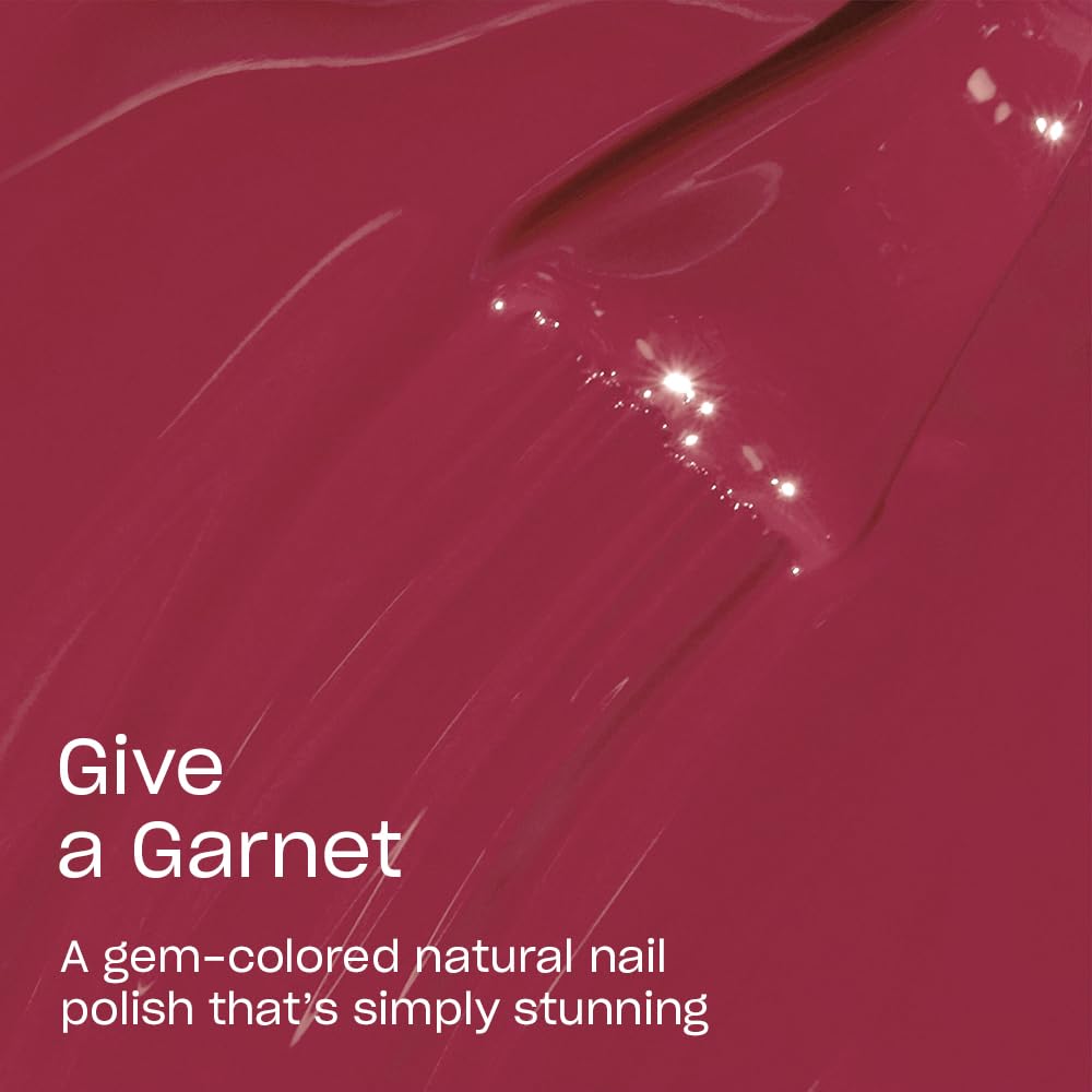 Close-up of OPI Nature Strong Give a Garnet nail polish brush