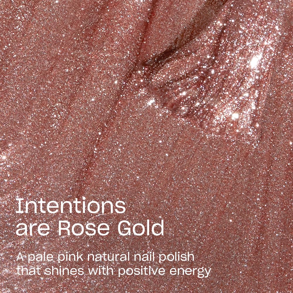 Close-up of OPI Nature Strong Rose Gold nail polish brush