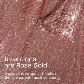 Close-up of OPI Nature Strong Rose Gold nail polish brush