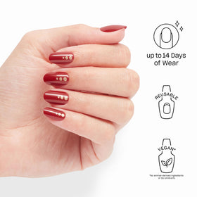 Close-up of OPI On Point Big Candy Apple Red nails with glitter