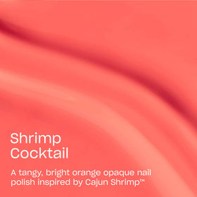 Close-up of OPI Shrimp Cocktail nail polish brush