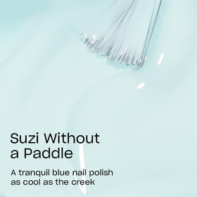 Close-up of OPI Suzi Without a Paddle nail polish brush