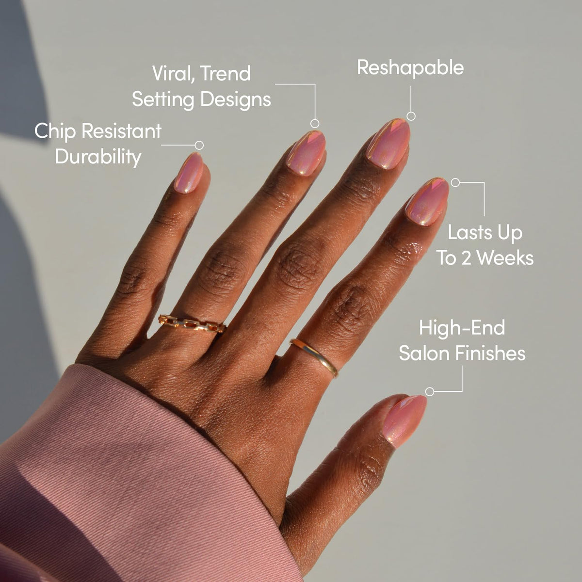 Close-up of orange-pink velvet press on nails