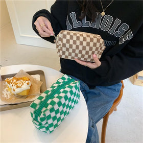 Close-up of PAZIMIIK Checkered Makeup Bag's soft fabric