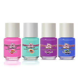 Close-up of Piggy Paint mini bottles with fruit scents