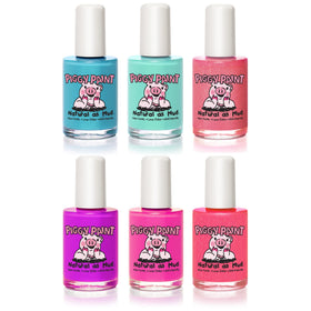Close-up of Piggy Paint nail polish bottles in various colours