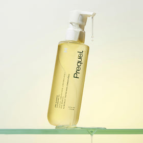 Close-up of Prequel Skin Cleansing Oil pump dispensing product