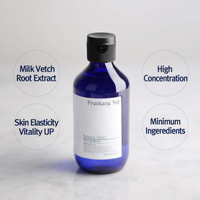 Close-up of Pyunkang Yul Essence Toner bottle showing label