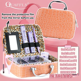 Close-up of QUAFFLY precision tweezers and eyelash curler