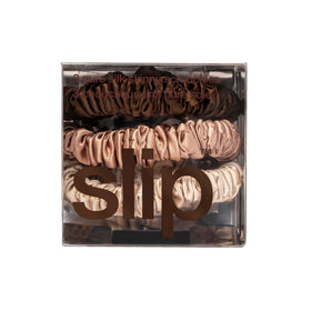 Close-up of SLIP Silk skinny scrunchies showing texture