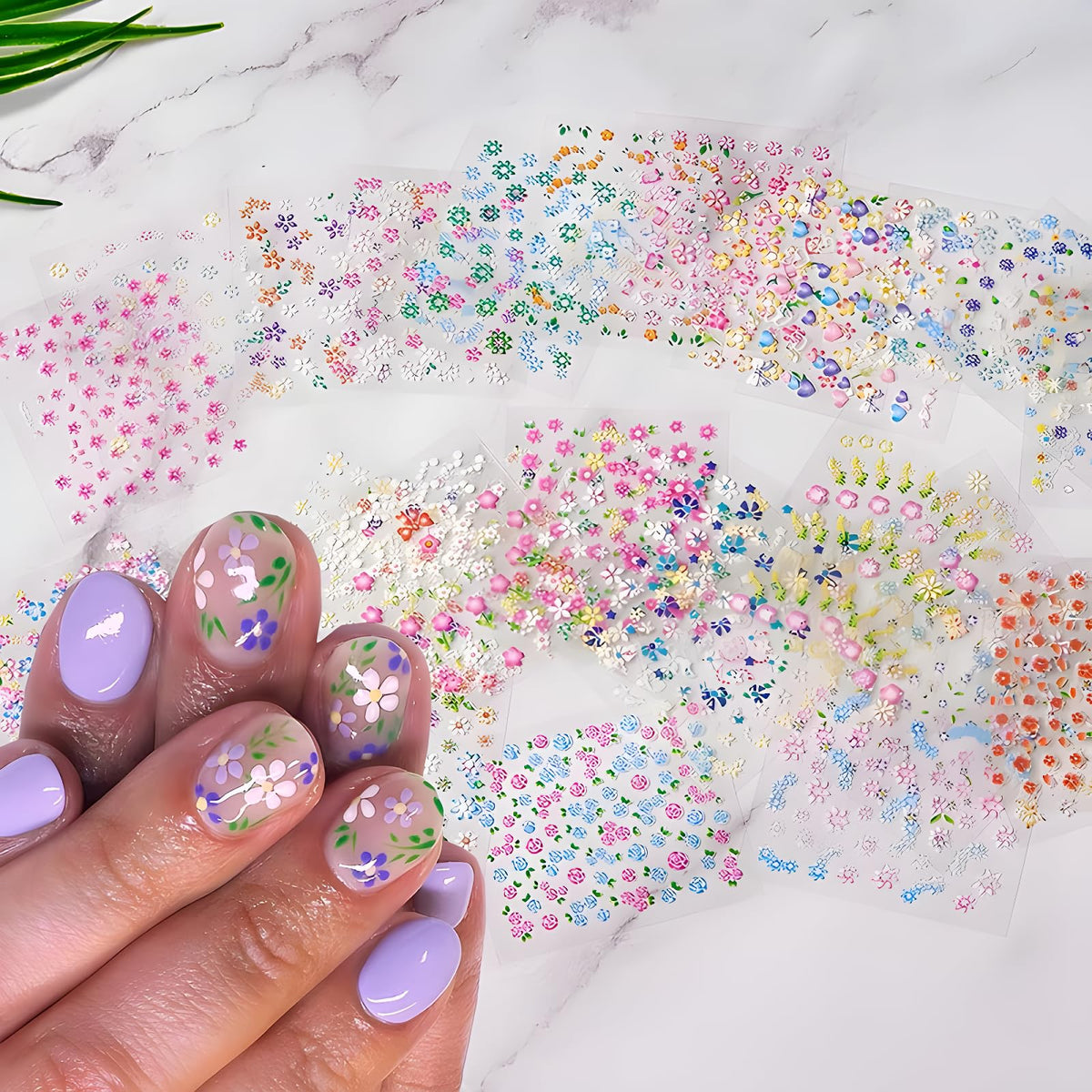 Close-up of SPLOCUDU nail stickers showing floral patterns