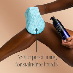 Close-up of St.Tropez Self Tan Applicator Mitt texture and material