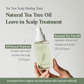 Close-up of STEAMBASE Tea Tree Scalp Healing Tonic ingredients on a wooden surface