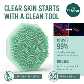Close-up of Sud Scrub silicone face scrubber showing soft bristles