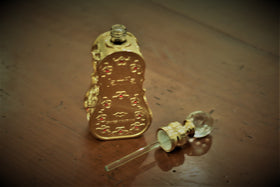 Close-up of Swiss Arabian Jamila perfume oil bottle