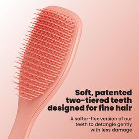 Close-up of TANGLE TEEZER brush showing soft-flex teeth