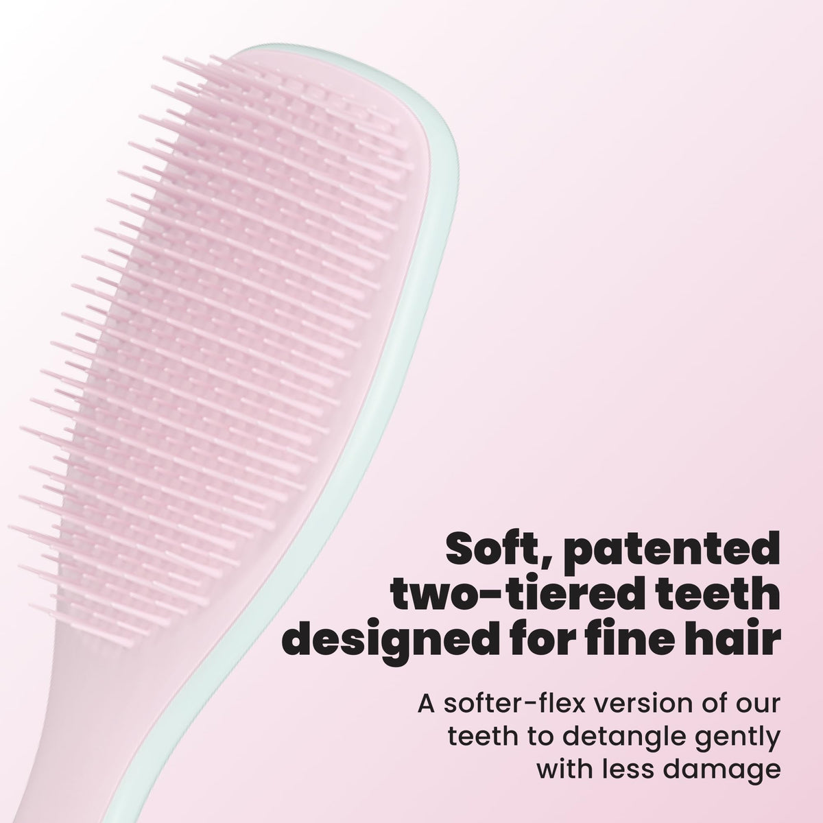 Close-up of TANGLE TEEZER brush showing soft-flex teeth