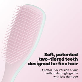 Close-up of TANGLE TEEZER brush showing soft-flex teeth