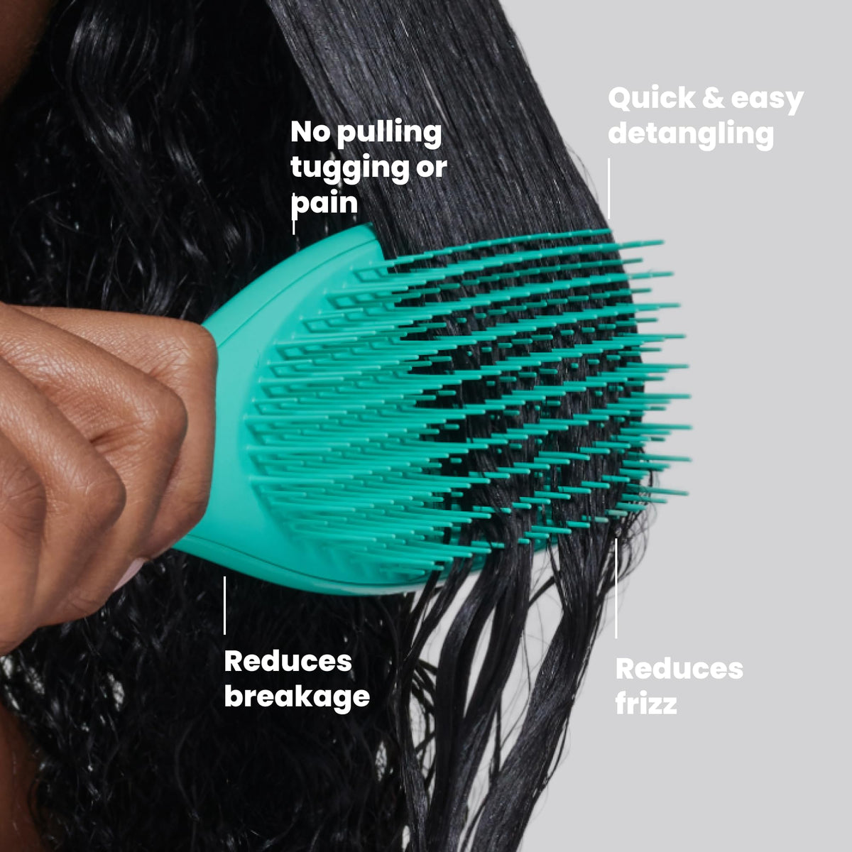 Close-up of TANGLE TEEZER brush with two-tiered teeth