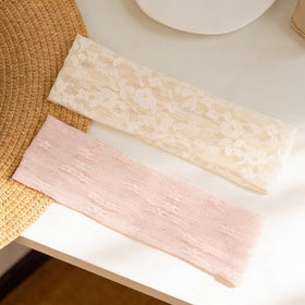 Close-up of TERSE Lace Headband showing intricate floral lace design