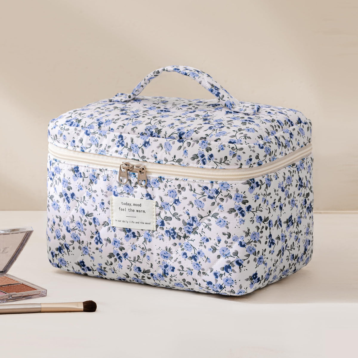 Close-up of the floral design on HBselect makeup bags