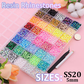 Close-up of TINKRSTUFF 5mm resin rhinestones in various colours