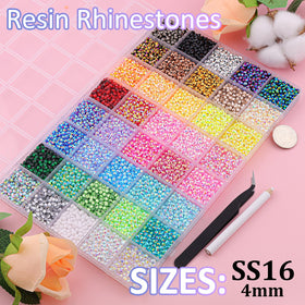 Close-up of TINKRSTUFF rhinestones showing various colors