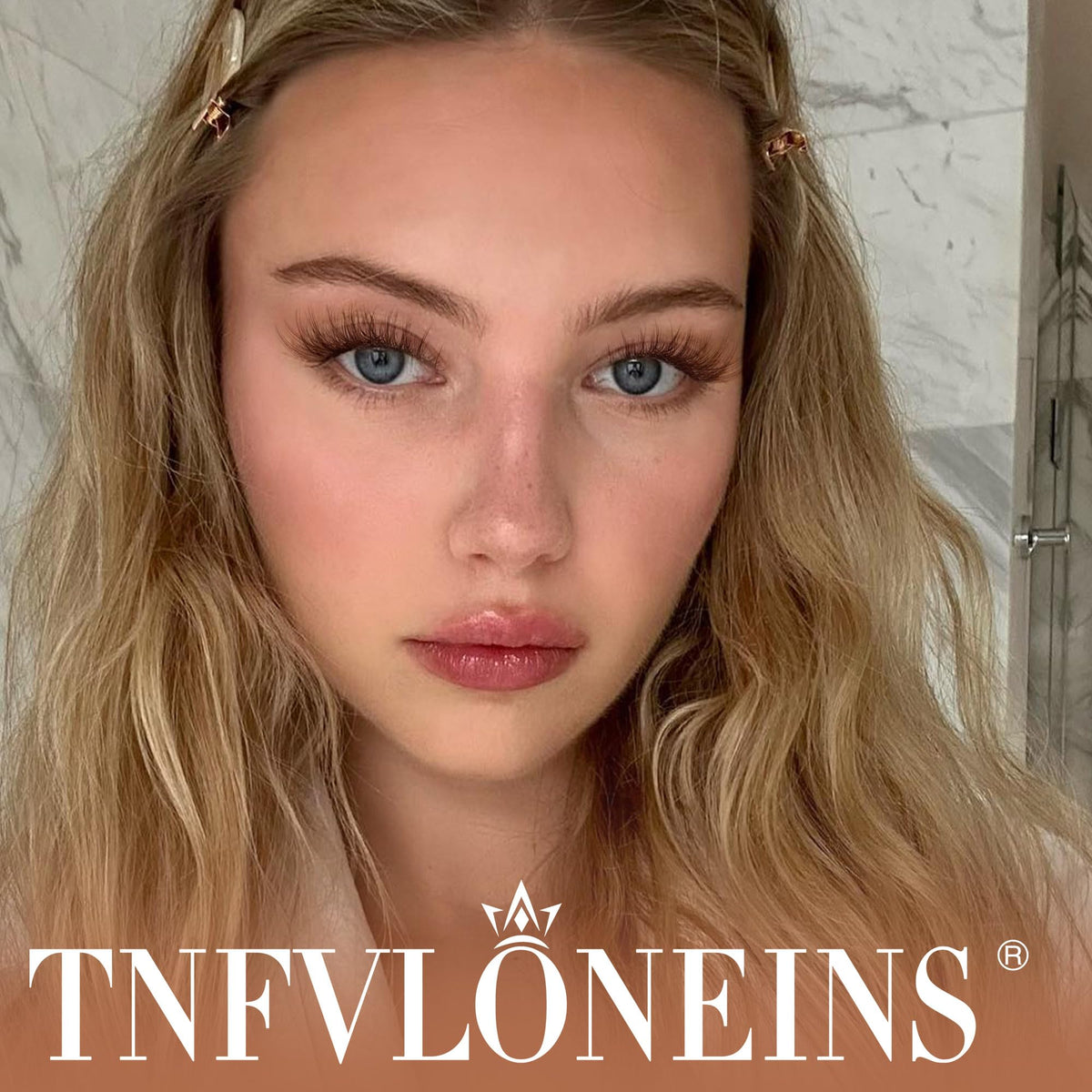 Close-up of TNFVLONEINS brown lash clusters in various lengths