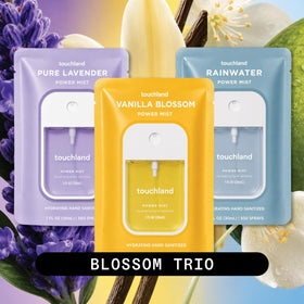 Close-up of Touchland Blossom Trio hand sanitizer spray bottle with Pure Lavender scent