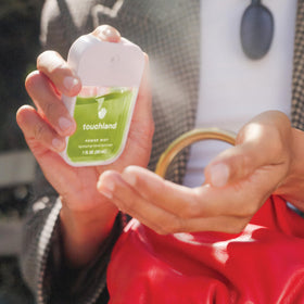 Close-up of Touchland Lemon Lime Spritz hand sanitizer spray nozzle