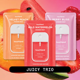 Close-up of Touchland Wild Watermelon hand sanitizer spray bottle