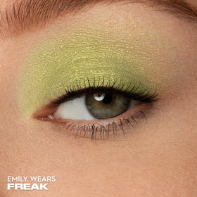 Close-up of URBAN DECAY 24/7 Eyeshadow Lime Green Shimmer packaging