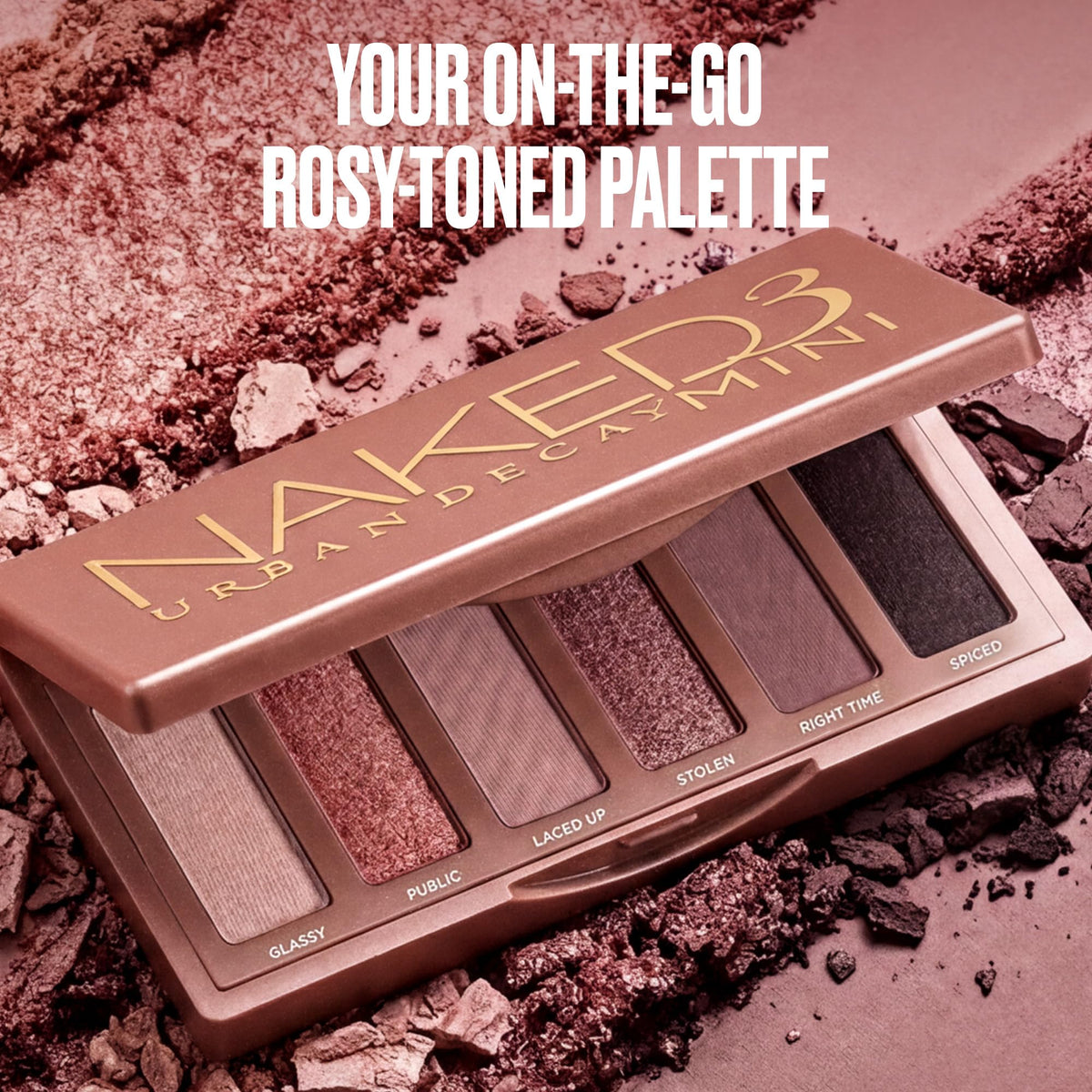 Close-up of URBAN DECAY Naked3 Mini Eyeshadow Palette with swatches