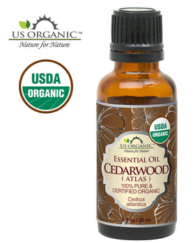 Close-up of US Organic Cedarwood Essential Oil bottle