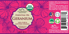 Close-up of US Organic Geranium Essential Oil bottle