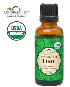 Close-up of US Organic Lime Essential Oil bottle and dropper