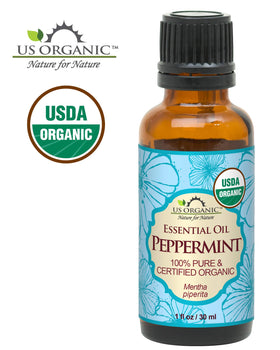 Close-up of US Organic Peppermint Essential Oil bottle
