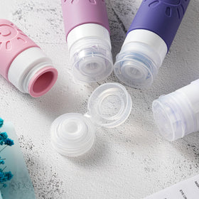 Close-up of Zafit silicone travel bottles with labels