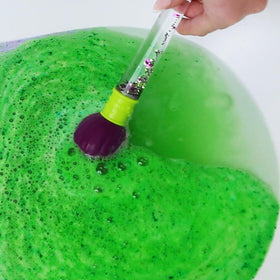 Close-up of ZIMPLI Baff Bombz Magic Brush bath bomb showing vibrant colours