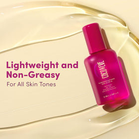 Coco & Eve Tan support Body Oil SPF45 on a sunlit table