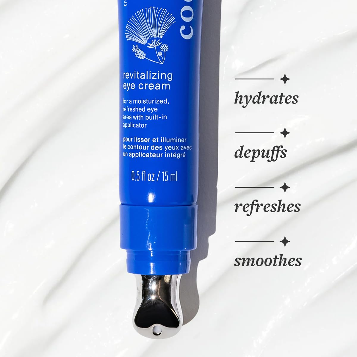 Cocokind Revitalizing Eye Cream on a bathroom counter