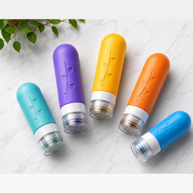 Complete Aeomni travel bottles set with accessories on display