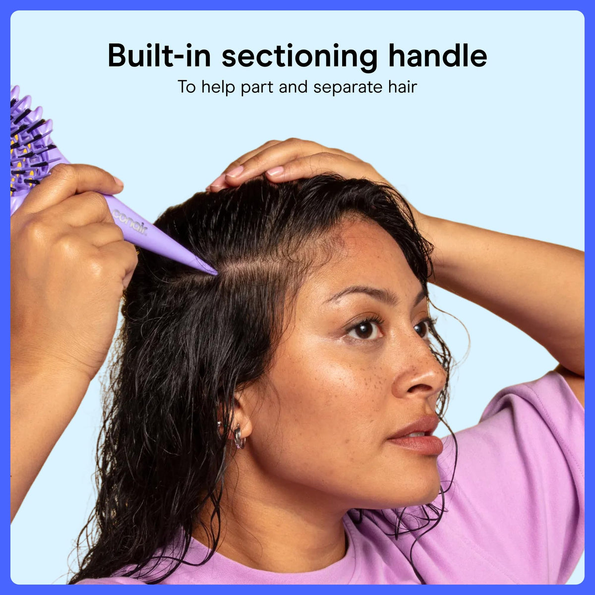 Conair Curl Define Pro Detangling Hair Brush on a bathroom counter