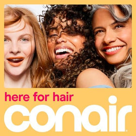 Conair Curling Iron 1 1/4-in back view showing dual voltage feature