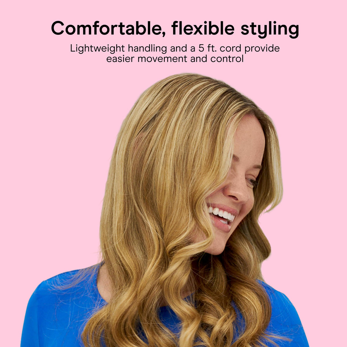 Conair Curling Iron 1 1/4-in lifestyle scene with model styling hair
